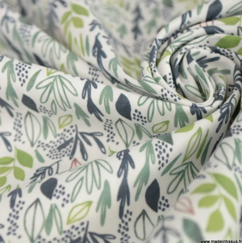 Tissu coton Lion motif petites feuilles exotiques vertes fond blanc