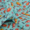 Tissu coton motif esprit Lego mécaniciens – Fond bleu clair