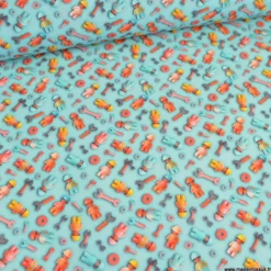 Tissu coton motif esprit Lego mécaniciens – Fond bleu clair