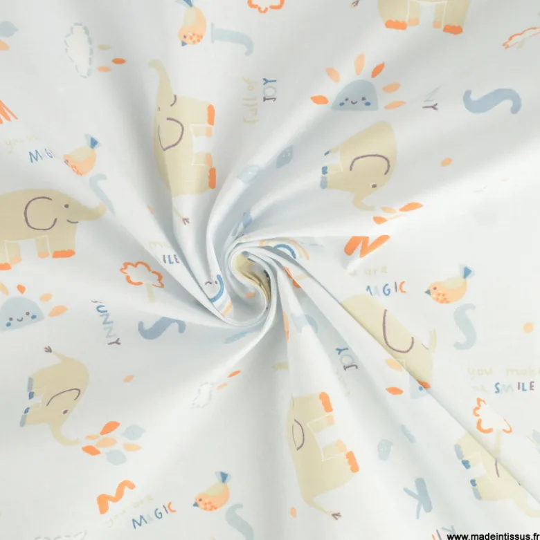 Tissu Coton Padao motif éléphants et arcs en ciel fond bleu clair - OEKO TEX
