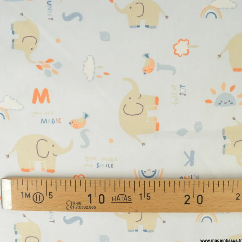 Tissu Coton Padao motif éléphants et arcs en ciel fond bleu clair - OEKO TEX