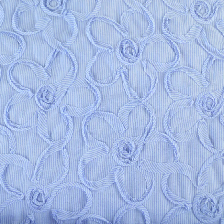 Tissu coton à ratyures Octave motif fleurs en relief
