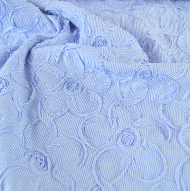 Tissu coton à ratyures Octave motif fleurs en relief