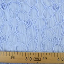 Tissu coton à ratyures Octave motif fleurs en relief