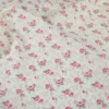 Tissu coton Suzanne motifs fleurs roses fond écru - OEKO TEX