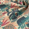 Tissu coton Tahoe motif perroquets et feuilles exotiques pétrole