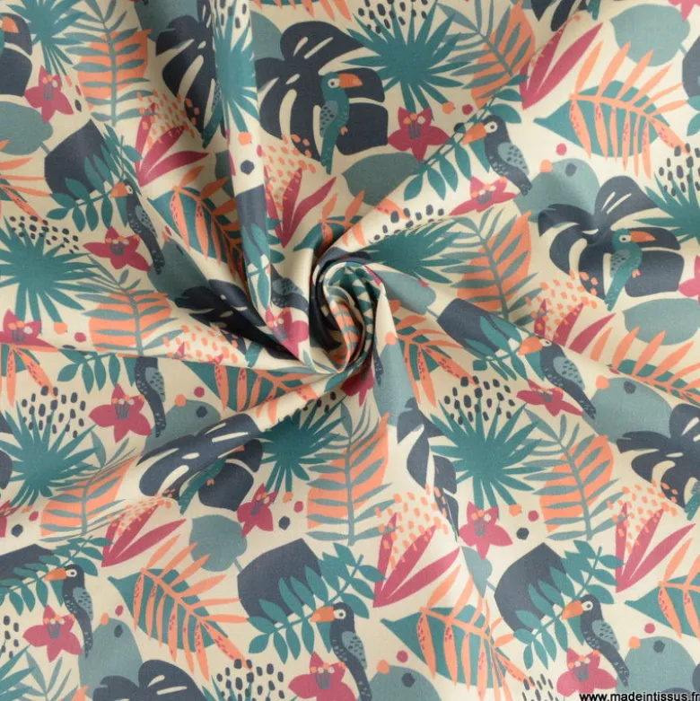 Tissu coton Tahoe motif perroquets et feuilles exotiques pétrole