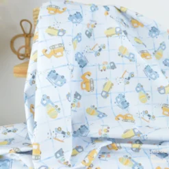 Tissu cretonne coton Cammy motif camions de chantier fond bleu