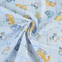 Tissu cretonne coton Cammy motif camions de chantier fond bleu
