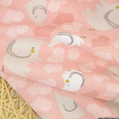 Tissu cretonne coton Febbey motifs éléphants et coeurs fond rose fané -OEKO TEX