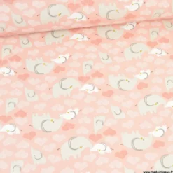 Tissu cretonne coton Febbey motifs éléphants et coeurs fond rose fané -OEKO TEX