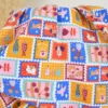 Tissu cretonne coton imprimé timbres animaux – OEKO TEX