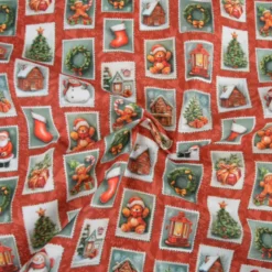 Tissu cretonne coton Noël motif timbres vintage fond rouge