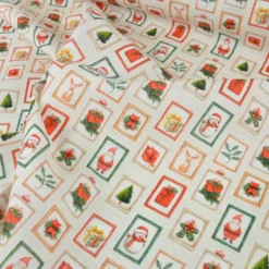 Tissu cretonne coton Noël motif cartes vintages
