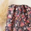 Tissu cretonne coton Olga fleurs roses fond marine
