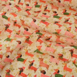 Tissu cretonne de coton Noël – Teckels et étoiles