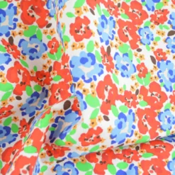 Tissu Cretonne de Coton Odalie motif fleurs rouges et bleues