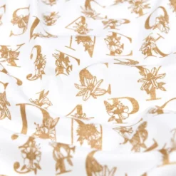 Tissu cretonne Effet broderie lettres Alphabétiques Or fond blanc - oeko tex