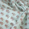 Tissu crêpe de coton motif fleurs Indiennes fond céladon - OEKO TEX