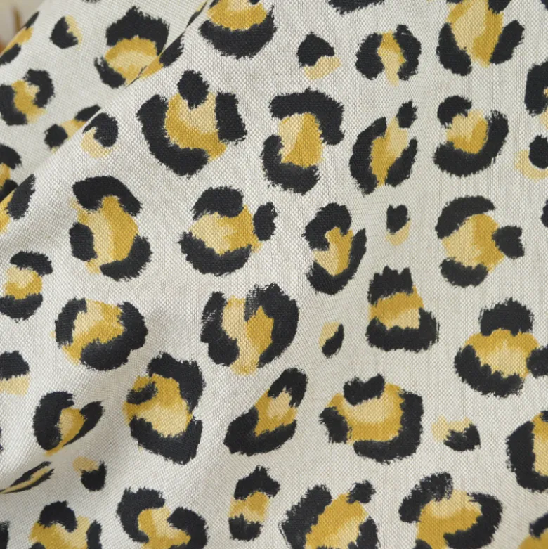 Tissu demi natté coton motif léopard doré fond aspect lin