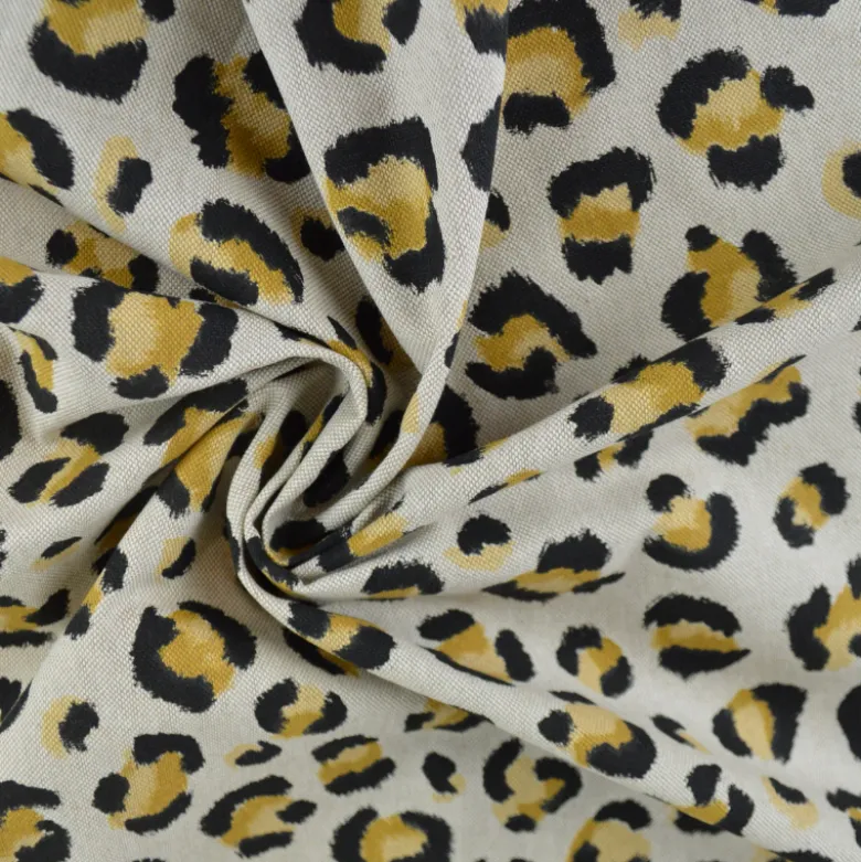 Tissu demi natté coton motif léopard doré fond aspect lin