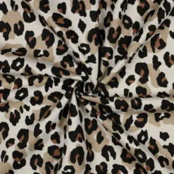 Tissu demi natté coton motif léopard fond aspect lin