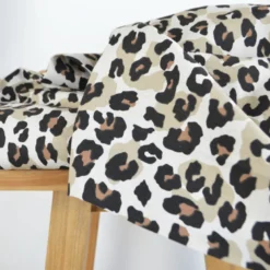 Tissu demi natté coton motif léopard fond aspect lin