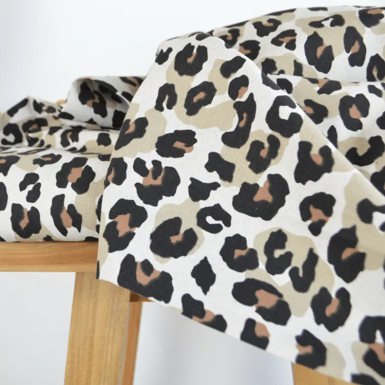 Tissu demi natté coton motif léopard fond aspect lin
