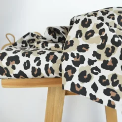 Tissu demi natté coton motif léopard fond aspect lin