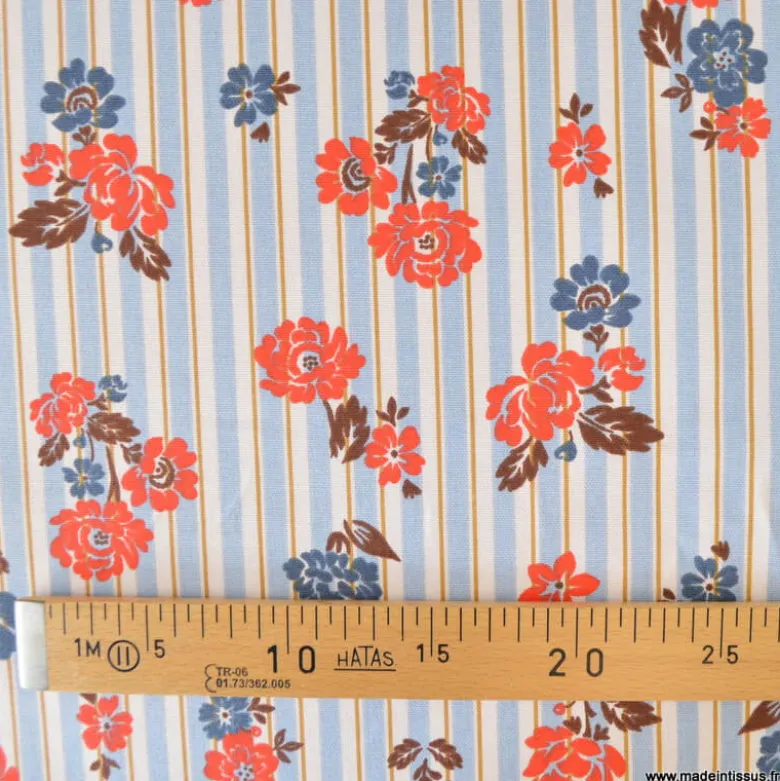 Tissu demi-natté coton Rimcha, rayures bleues et fleurs rouges/bleues