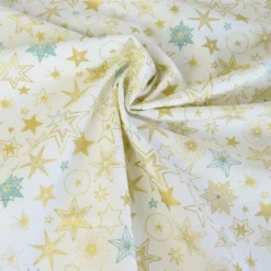 Tissu de Noël Edmé motif étoiles Or fond Blanc cassé - OEKO TEX
