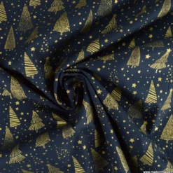 Tissu de Noël motif foret de sapins et étoiles or fond bleu marine - OEKO TEX