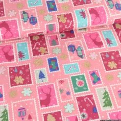 Tissu de Noël motif timbres et flocons fond rose - OEKO TEX