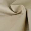 Tissu d'extérieur imperméable beige clair pour protection pluie et soleil