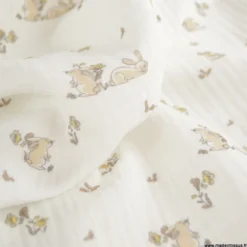 Tissu Double Gaze Bio – Motif Lapins beige & Fleurs