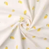 Tissu Double gaze brodée citrons fond blanc - oeko tex