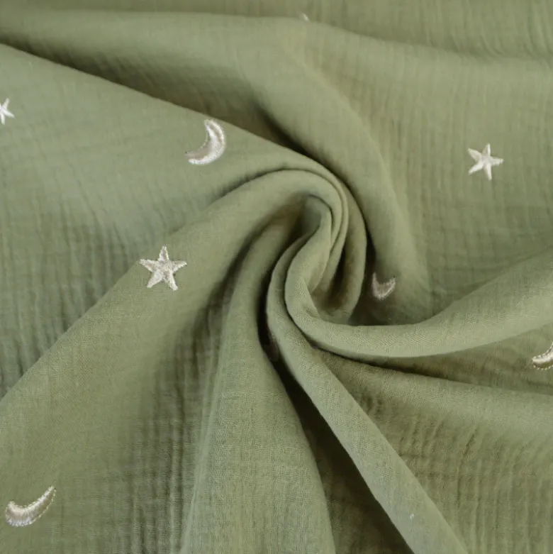 Tissu Double gaze brodée lunes et étoiles fond kaki - OEKO TEX