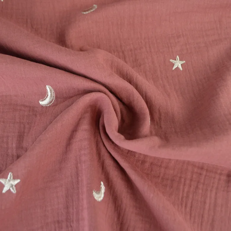 Tissu Double gaze brodée lunes et étoiles fond terracotta - OEKO TEX