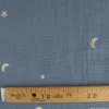 Tissu Double gaze brodée lunes et étoiles fond bleu jean - OEKO TEX