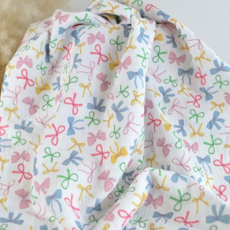 Tissu double gaze Celanie motif noeuds fond blanc