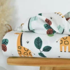 Tissu Double gaze coton motif girafes fond blanc cassé - OEKO TEX
