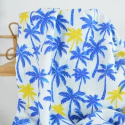 Tissu Double gaze coton motif palmiers bleus et jaunes - OEKO TEX