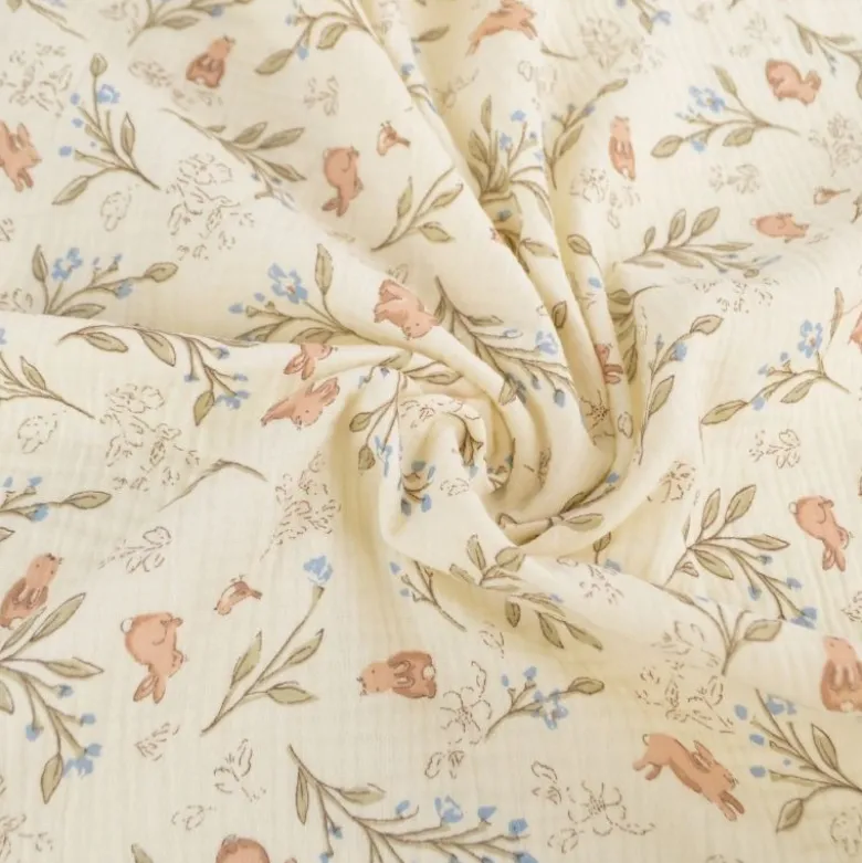 Tissu double gaze de coton Ariella lapins & feuillage fond écru