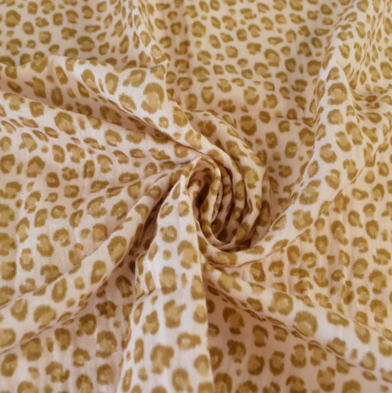 Tissu double gaze de coton Balzac motif Léopard fond beige rosé