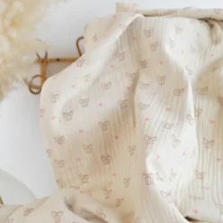 Tissu double gaze de coton Bio Poppy motif nœuds fond naturel