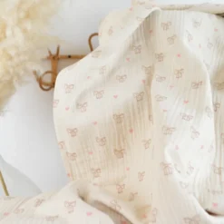 Tissu double gaze de coton Bio Poppy motif nœuds fond naturel