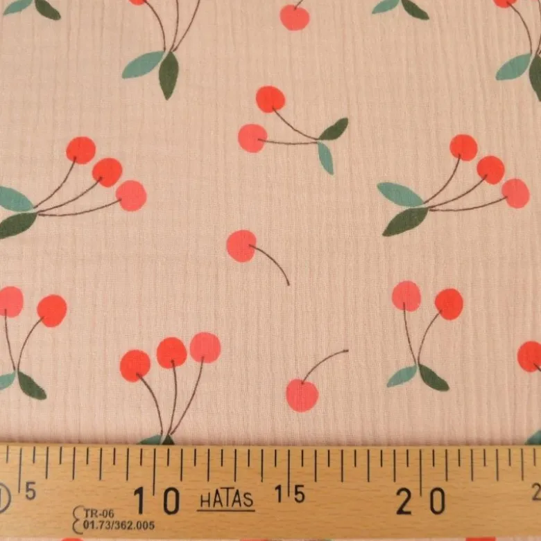 Tissu double gaze de coton Clafoutis motif cerises fond skin