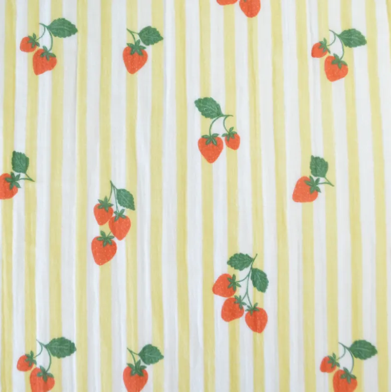 Tissu double gaze de coton Gariguette motif fraises et rayures jaunes