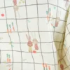 Tissu double gaze de coton Ilyes motif lapins et carreaux