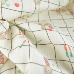 Tissu double gaze de coton Ilyes motif lapins et carreaux